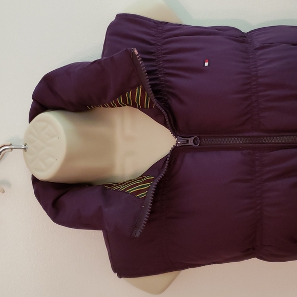 Tommy Hilfiger puffer vest in a size M.  It is a deep purple in color.   EUC - Picture 2 of 7